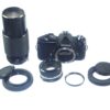 Nikon FM black 35mm mechanical camera with Nikon 50mm lens and Vivitar 80–200mmzoom lens Ex++