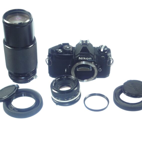 Nikon FM black 35mm mechanical camera with Nikon 50mm lens and Vivitar 80–200mmzoom lens Ex++