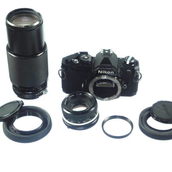 Nikon FM black 35mm mechanical camera with Nikon 50mm lens and Vivitar 80–200mmzoom lens Ex++