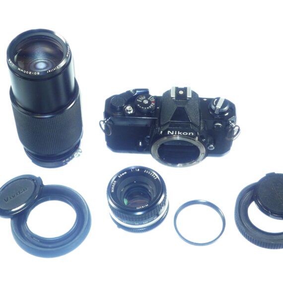 Nikon FM black 35mm mechanical camera with Nikon 50mm lens and Vivitar 80–200mmzoom lens Ex++