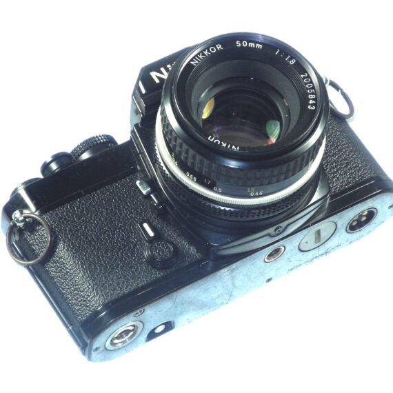 Nikon FM black 35mm mechanical camera with Nikon 50mm lens and Vivitar 80–200mmzoom lens Ex++