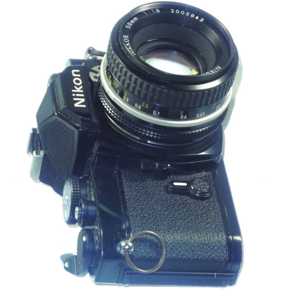 Nikon FM black 35mm mechanical camera with Nikon 50mm lens and Vivitar 80–200mmzoom lens Ex++