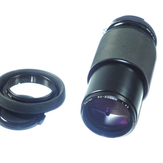 Nikon FM black 35mm mechanical camera with Nikon 50mm lens and Vivitar 80–200mmzoom lens Ex++