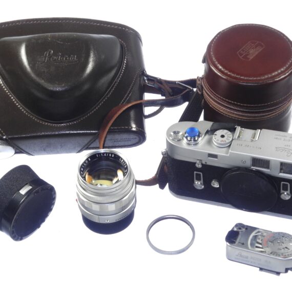 Leica M4 silver chrome camera with Leica 50/1,4 Summilux chrome "Wetzlar" lens sold with hood,caps, cases Mint/- set