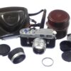Leica M4 silver chrome camera with Leica 50/1,4 Summilux chrome "Wetzlar" lens sold with hood,caps, cases Mint/- set