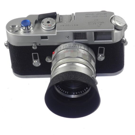 Leica M4 silver chrome camera with Leica 50/1,4 Summilux chrome "Wetzlar" lens sold with hood,caps, cases Mint/- set
