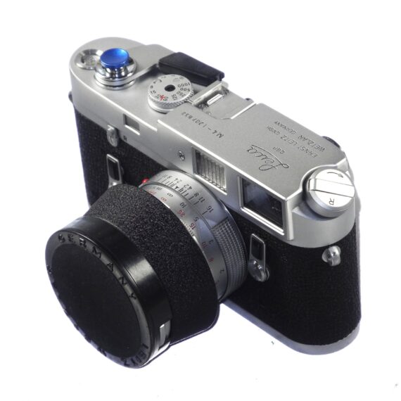 Leica M4 silver chrome camera with Leica 50/1,4 Summilux chrome "Wetzlar" lens sold with hood,caps, cases Mint/- set