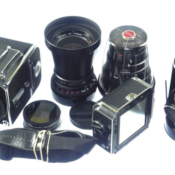 Hasselblad 500 C/M camera with Hasselblad 50mm,150mm, A12 & A24 backs, filters, hoods,strap,caps, in black sytem case Mint- / Free Shipping (USA)Mint- / Free Shipping