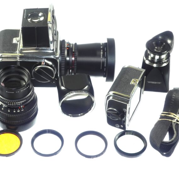 Hasselblad 500 C/M camera with Hasselblad 50mm,150mm, A12 & A24 backs, filters, hoods,strap,caps, in black sytem case Mint- / Free Shipping (USA)Mint- / Free Shipping