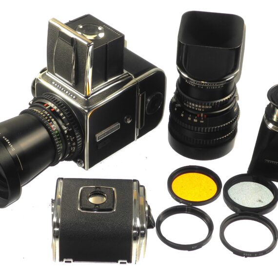 Hasselblad 500 C/M camera with Hasselblad 50mm,150mm, A12 & A24 backs, filters, hoods,strap,caps, in black sytem case Mint- / Free Shipping (USA)Mint- / Free Shipping
