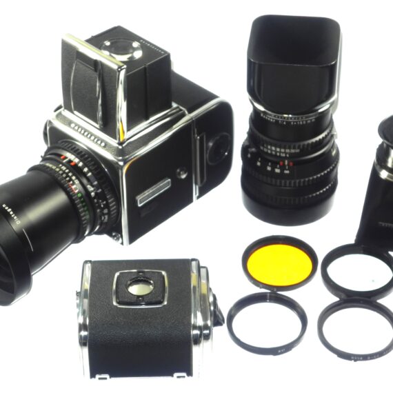 Hasselblad 500 C/M camera with Hasselblad 50mm,150mm, A12 & A24 backs, filters, hoods,strap,caps, in black sytem case Mint- / Free Shipping (USA)Mint- / Free Shipping