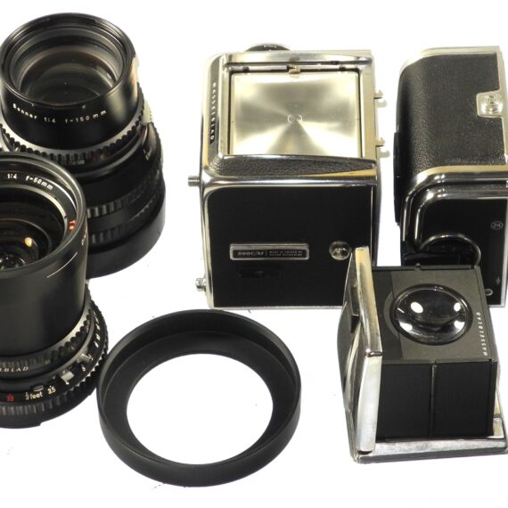 Hasselblad 500 C/M camera with Hasselblad 50mm,150mm, A12 & A24 backs, filters, hoods,strap,caps, in black sytem case Mint- / Free Shipping (USA)Mint- / Free Shipping
