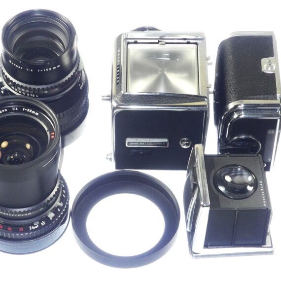 Hasselblad 500 C/M camera with Hasselblad 50mm,150mm, A12 & A24 backs, filters, hoods,strap,caps, in black sytem case Mint- / Free Shipping (USA)Mint- / Free Shipping