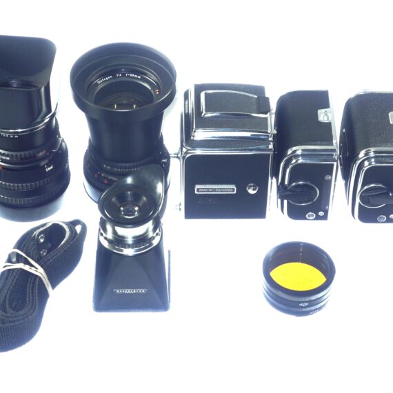 Hasselblad 500 C/M camera with Hasselblad 50mm,150mm, A12 & A24 backs, filters, hoods,strap,caps, in black sytem case Mint- / Free Shipping (USA)Mint- / Free Shipping