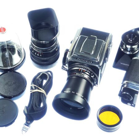 Hasselblad 500 C/M camera with Hasselblad 50mm,150mm, A12 & A24 backs, filters, hoods,strap,caps, in black sytem case Mint- / Free Shipping (USA)Mint- / Free Shipping