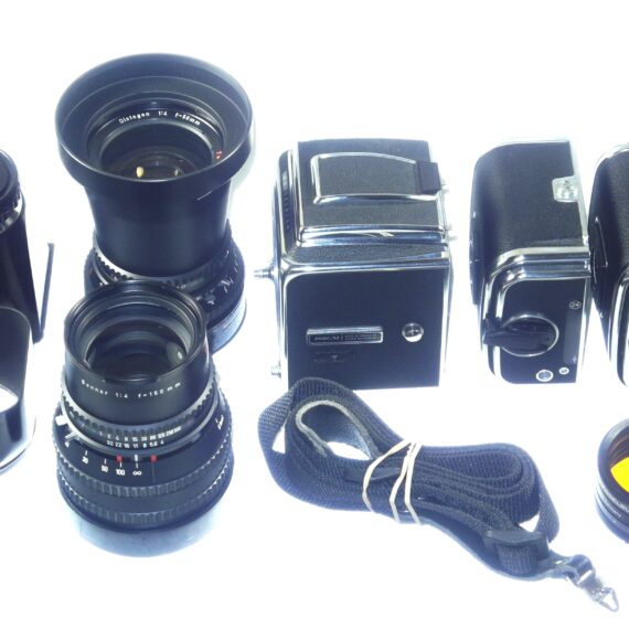 Hasselblad 500 C/M camera with Hasselblad 50mm,150mm, A12 & A24 backs, filters, hoods,strap,caps, in black sytem case Mint- / Free Shipping (USA)Mint- / Free Shipping