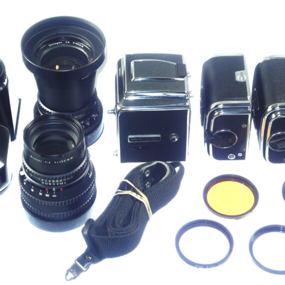 Hasselblad 500 C/M camera with Hasselblad 50mm,150mm, A12 & A24 backs, filters, hoods,strap,caps, in black sytem case Mint- / Free Shipping (USA)Mint- / Free Shipping